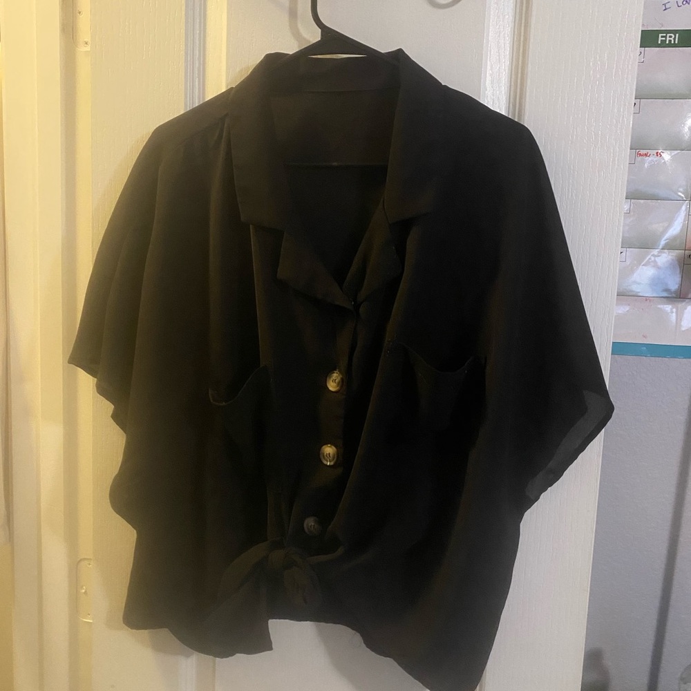 Loose black buttoned top
